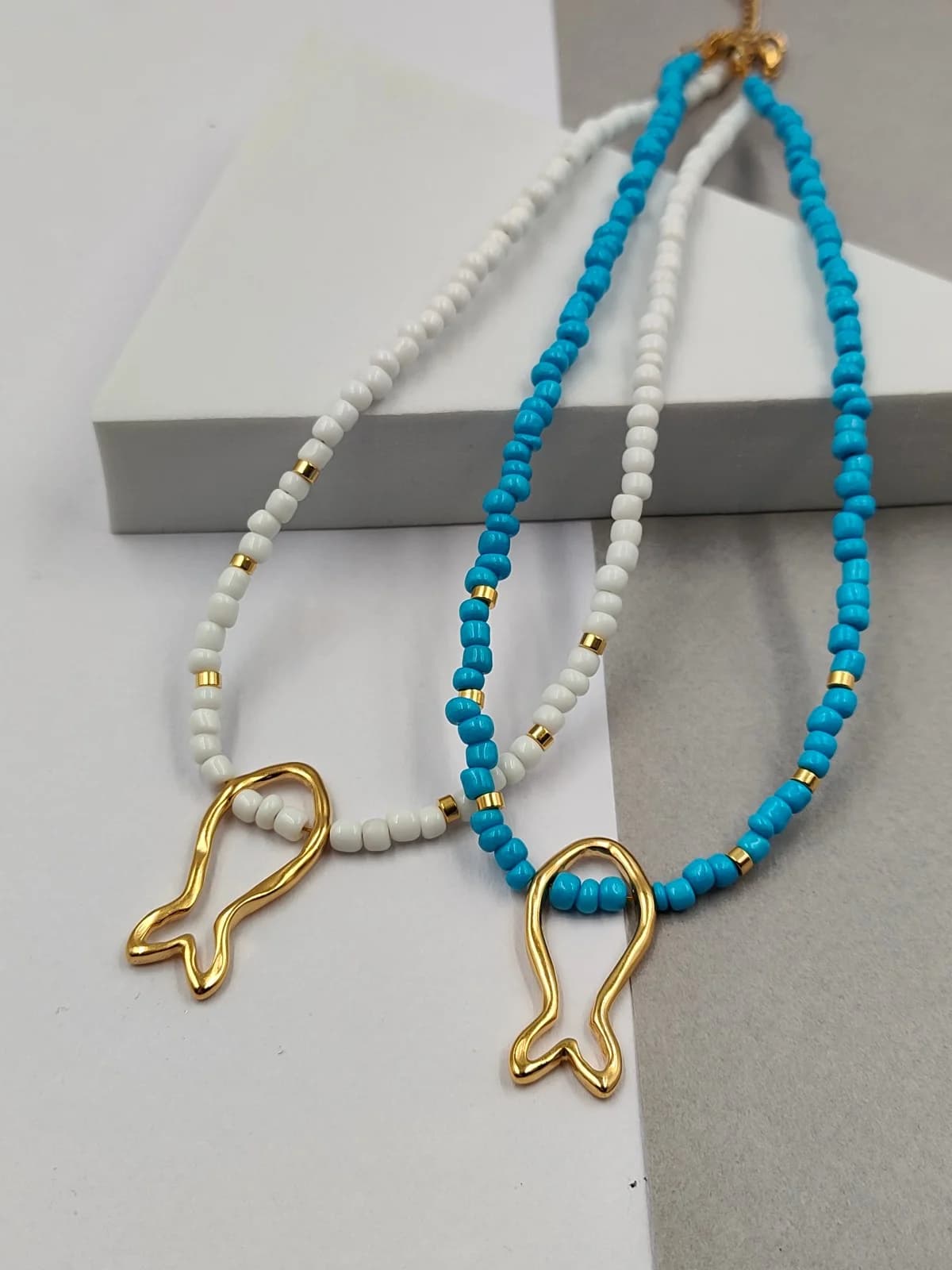 Necklace with Glass Beads, Gold-Plated Details and Fish Design by Magis Handmade Jewels
