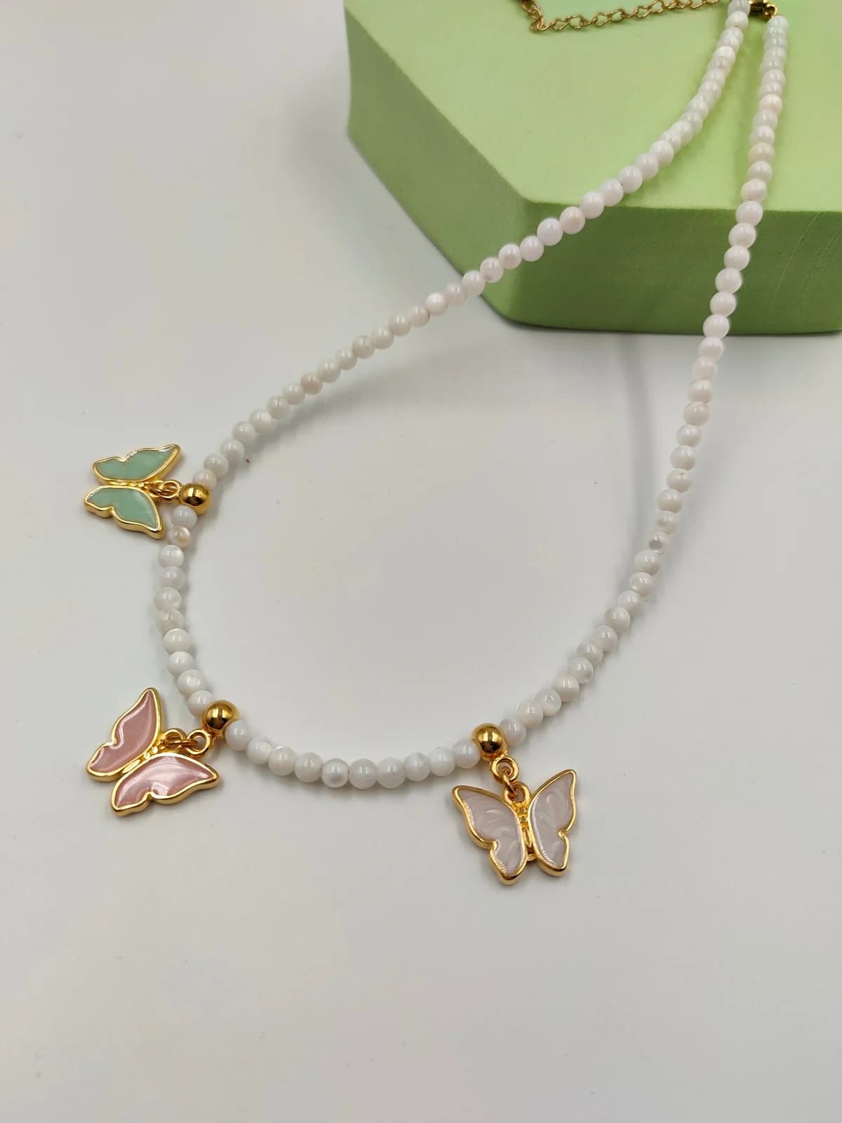 Necklace with Mother-of-Pearl Beads and Gold-Plated Enamel Butterfly by Magis Handmade Jewels