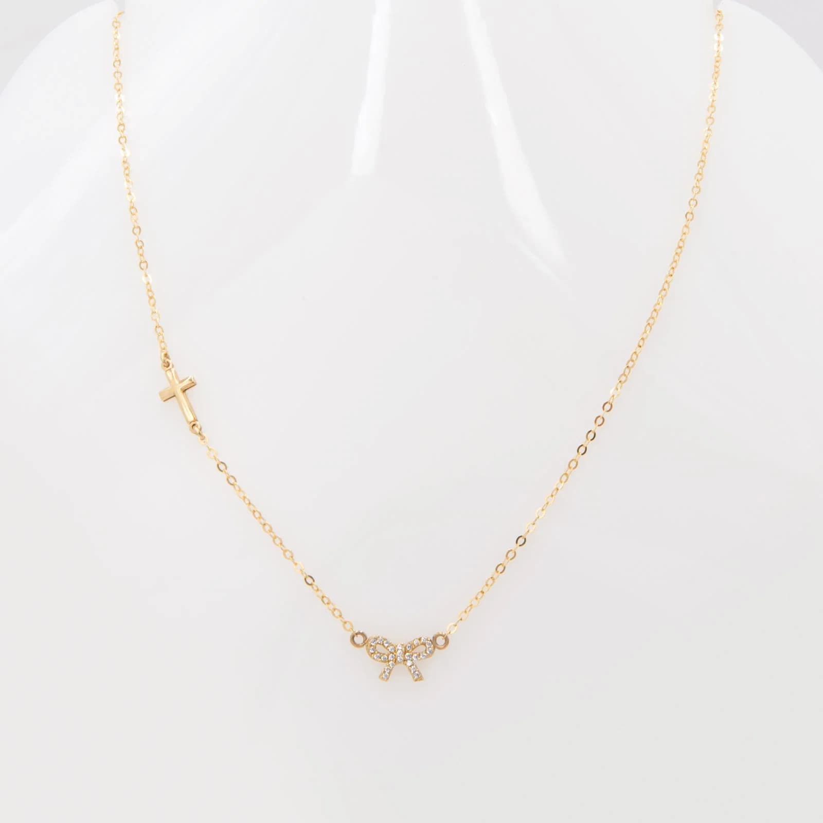Gold Cross Bow Necklace — Necklaces from AntEva Crafts