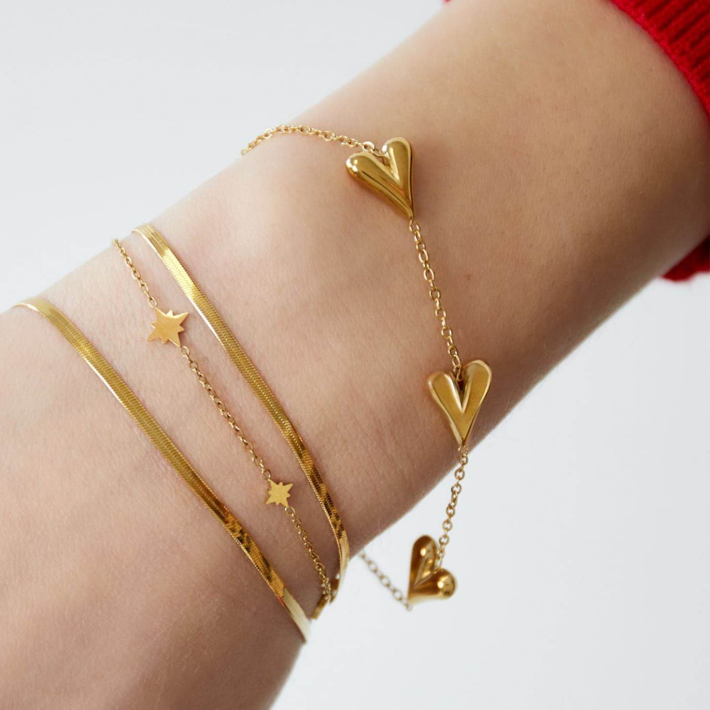 Stainless Steel Jewelry: Gold-plated Bracelet with Metal Hearts — Bracelets from Toolittle