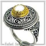 Oxidised sterling silver ring with 18k gold filled bezel and natural pearl center stone.