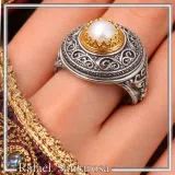 Oxidised sterling silver ring with 18k gold filled bezel and natural pearl center stone.
