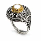 Oxidised sterling silver ring with 18k gold filled bezel and natural pearl center stone.