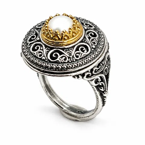 Oxidised sterling silver ring with 18k gold filled bezel and natural pearl center stone.