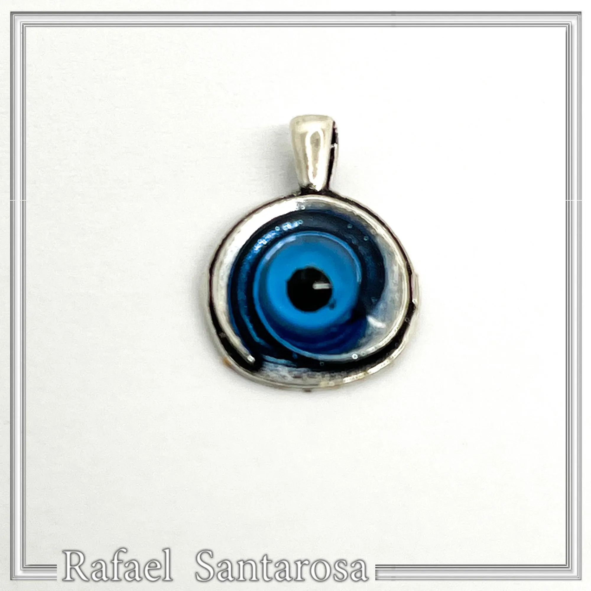 Evil Eye Spiral Talisman Necklace: Sky Blue Transparent Enamel on Oxidised Sterling Silver — additional product image 7 from Rafael Santarosa Fine Jewelry