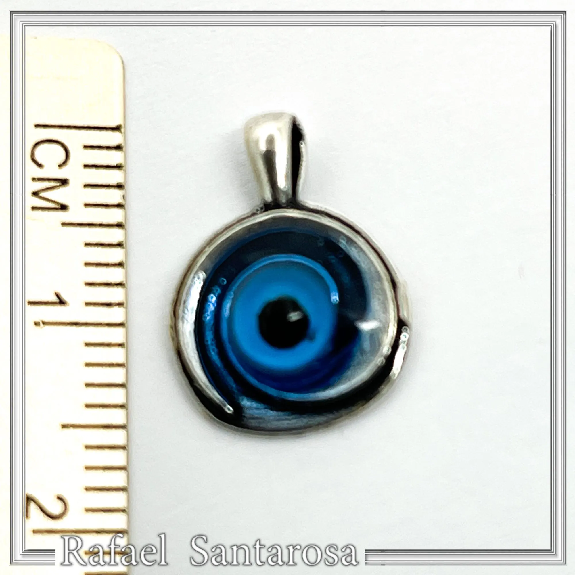 Evil Eye Spiral Talisman Necklace: Sky Blue Transparent Enamel on Oxidised Sterling Silver — additional product image 10 from Rafael Santarosa Fine Jewelry