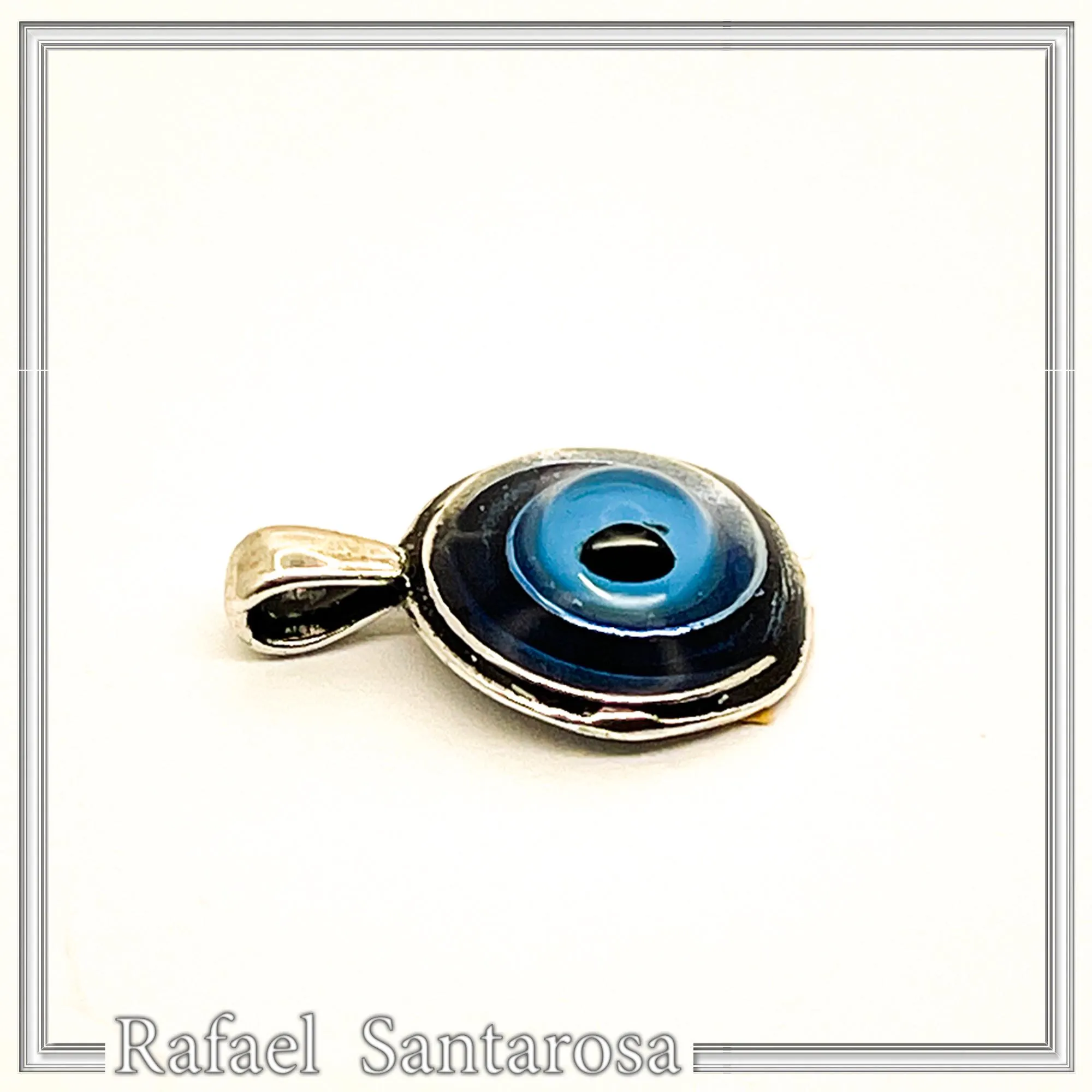 Evil Eye Spiral Talisman Necklace: Sky Blue Transparent Enamel on Oxidised Sterling Silver — additional product image 4 from Rafael Santarosa Fine Jewelry