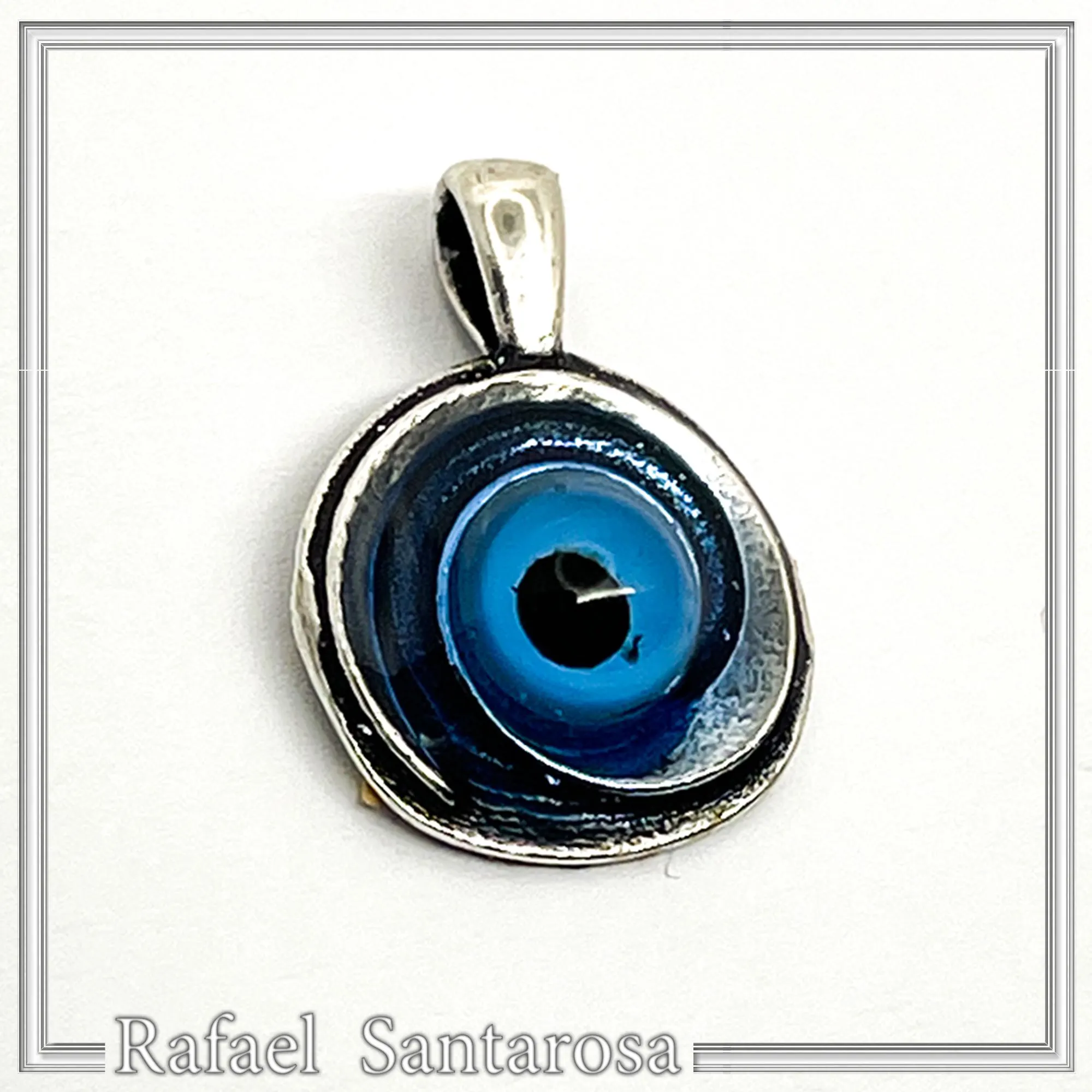 Evil Eye Spiral Talisman Necklace: Sky Blue Transparent Enamel on Oxidised Sterling Silver — additional product image 8 from Rafael Santarosa Fine Jewelry