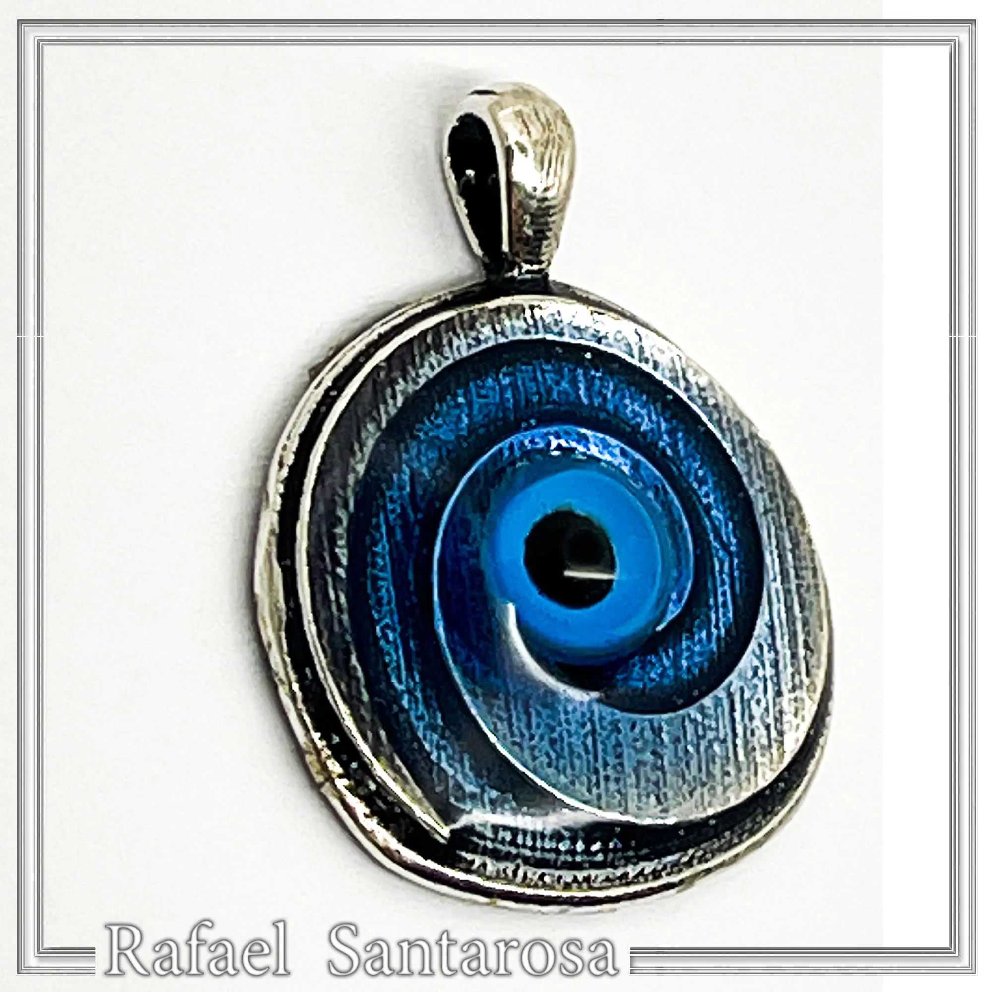 Evil Eye Spiral Talisman Necklace: Sky Blue Transparent Enamel on Oxidised Sterling Silver — additional product image 2 from Rafael Santarosa Fine Jewelry
