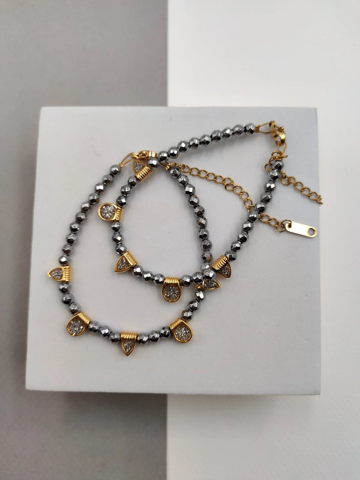 Bracelet with Hematite Beads and Gold-Plated Enamel Details by Magis Handmade Jewels – view 3
