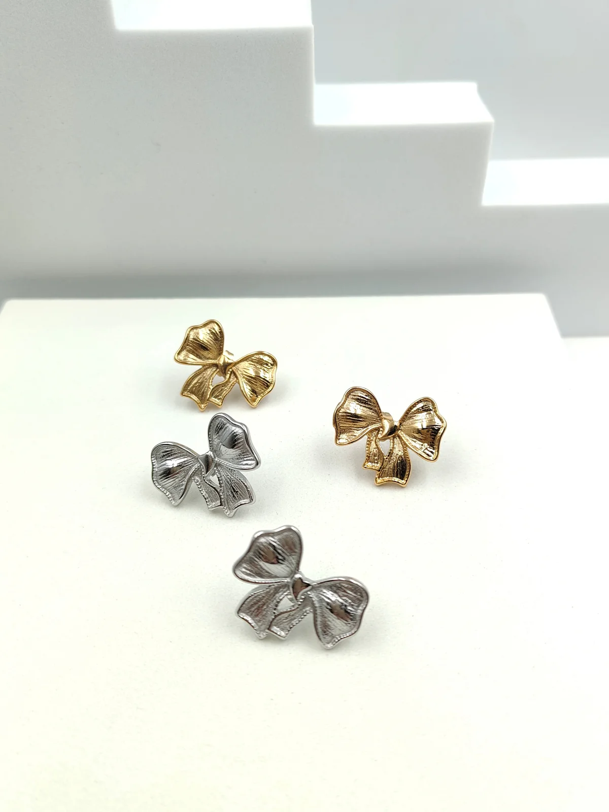 Stainless Steel Embossed Bow Earrings by Magis Handmade Jewels – view 2