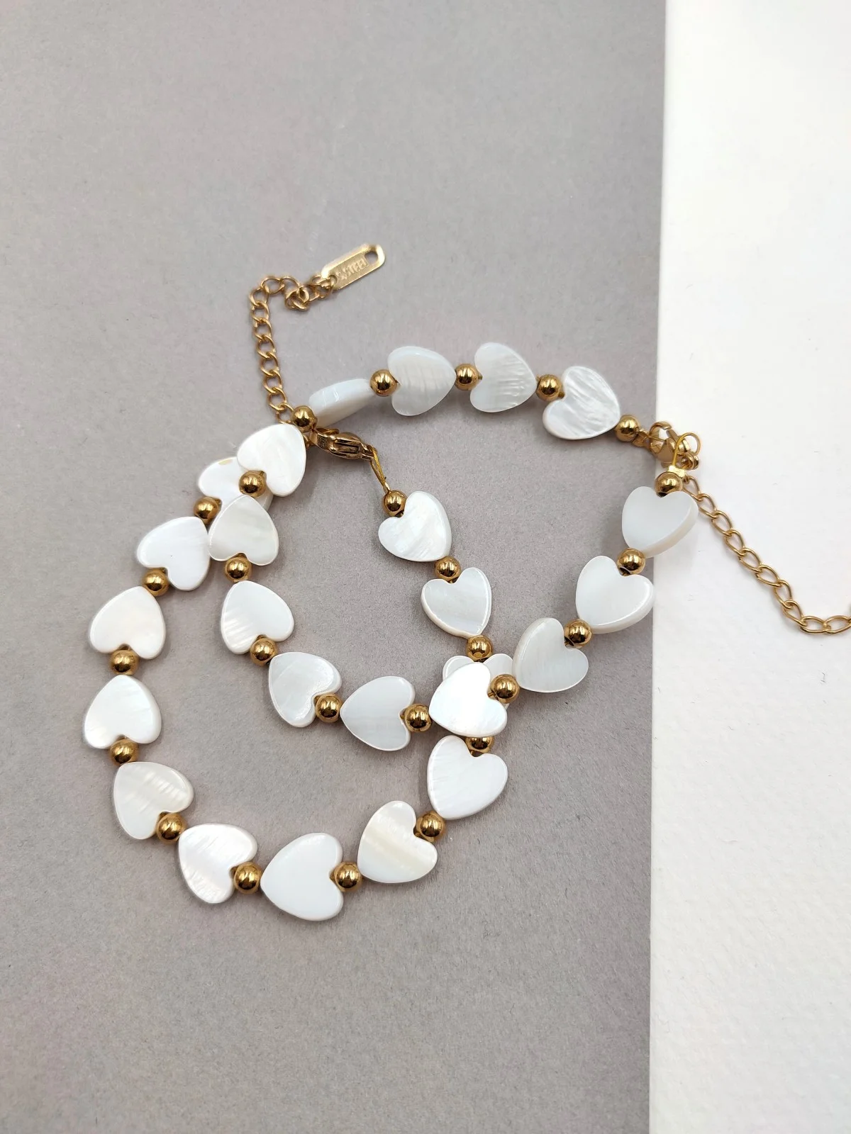 Stainless Steel Bracelet with Mother-of-Pearl Hearts by Magis Handmade Jewels – view 4