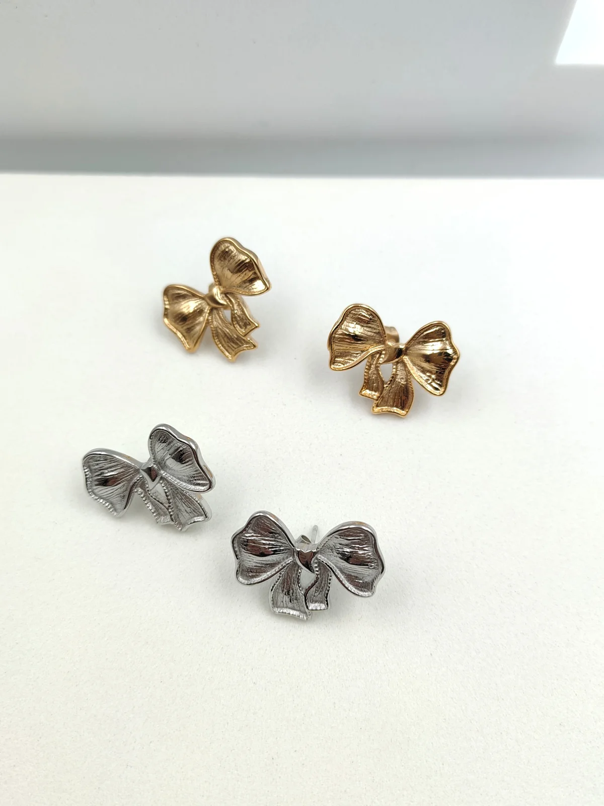 Stainless Steel Embossed Bow Earrings by Magis Handmade Jewels – view 3