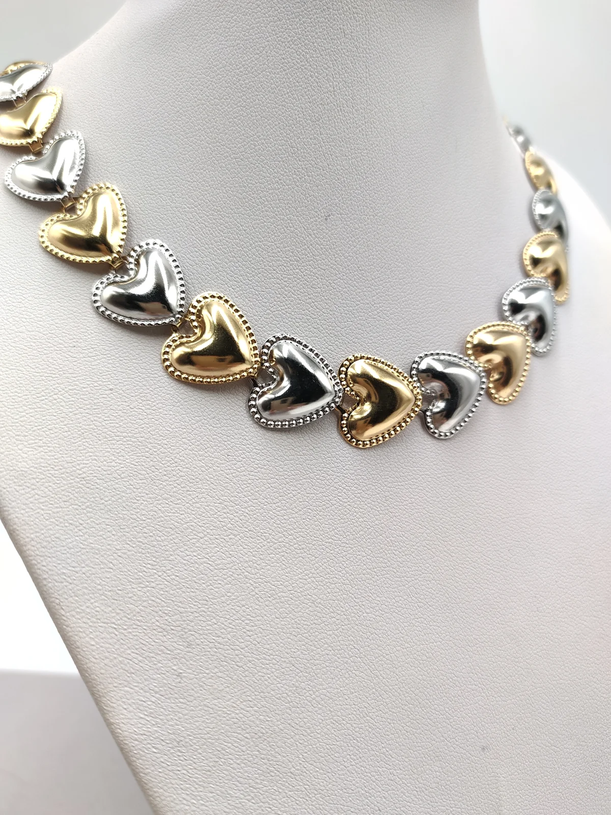 Stainless Steel Necklace with Two-Tone Hearts by Magis Handmade Jewels – view 3