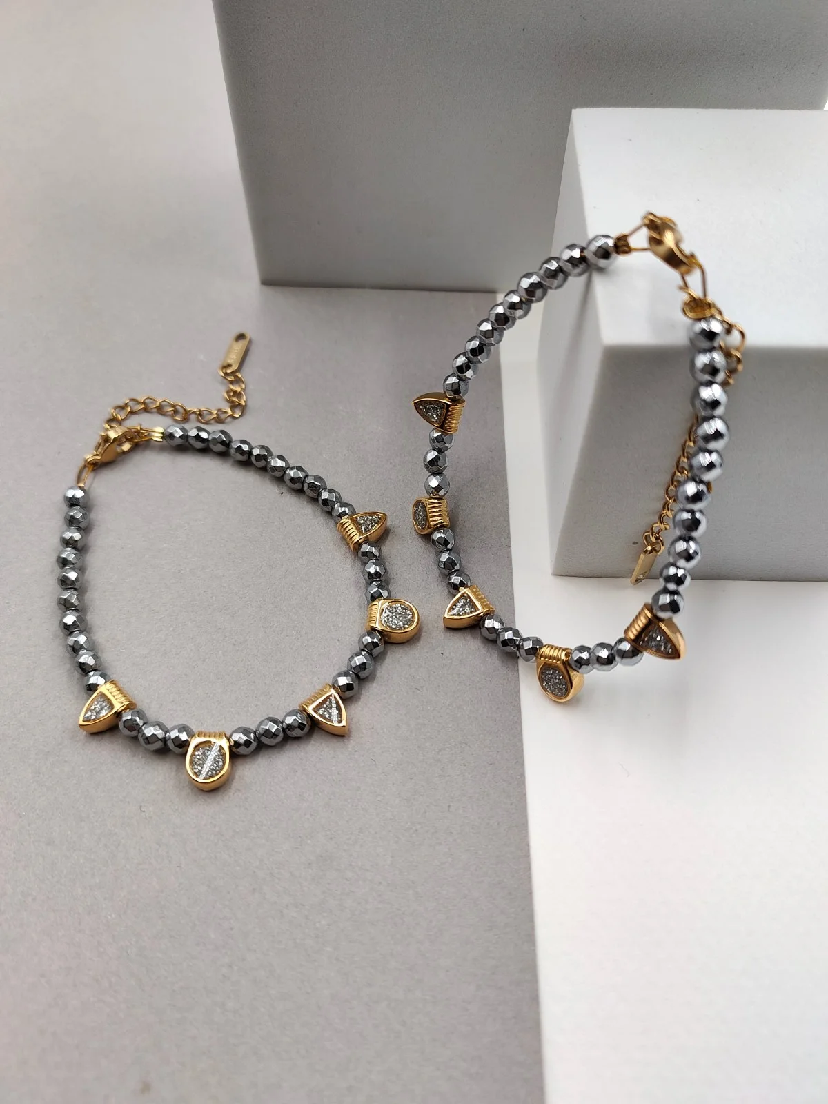 Bracelet with Hematite Beads and Gold-Plated Enamel Details by Magis Handmade Jewels – view 2