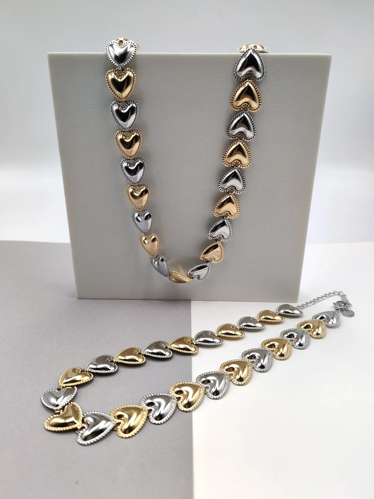 Stainless Steel Necklace with Two-Tone Hearts by Magis Handmade Jewels – view 4