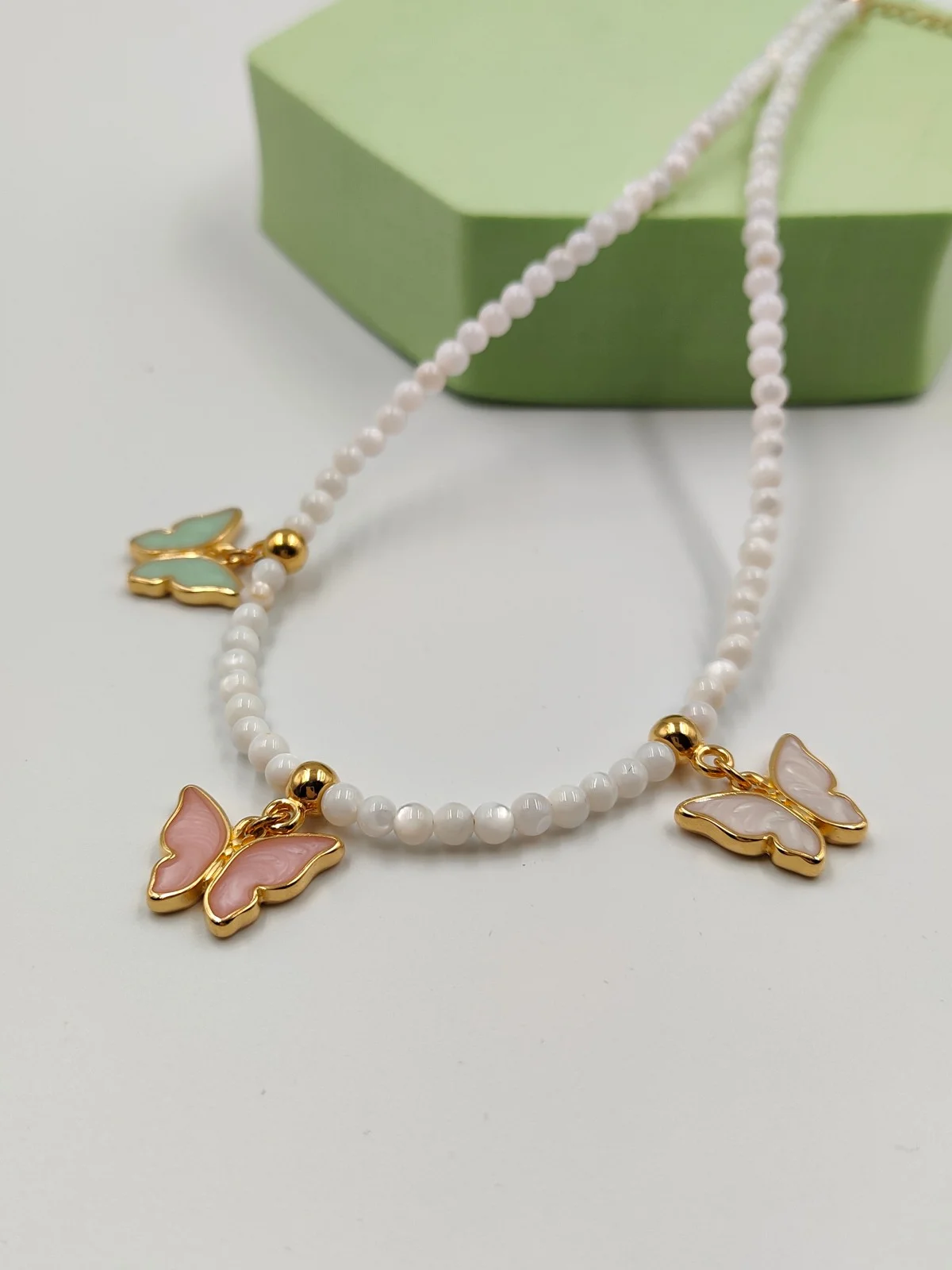 Necklace with Mother-of-Pearl Beads and Gold-Plated Enamel Butterfly by Magis Handmade Jewels – view 3
