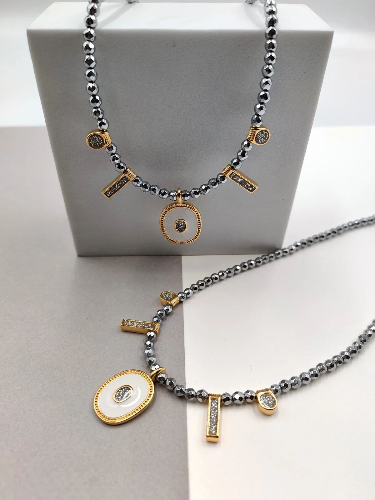 Necklace with Hematite Beads and Gold-Plated Enamel Details by Magis Handmade Jewels – view 2