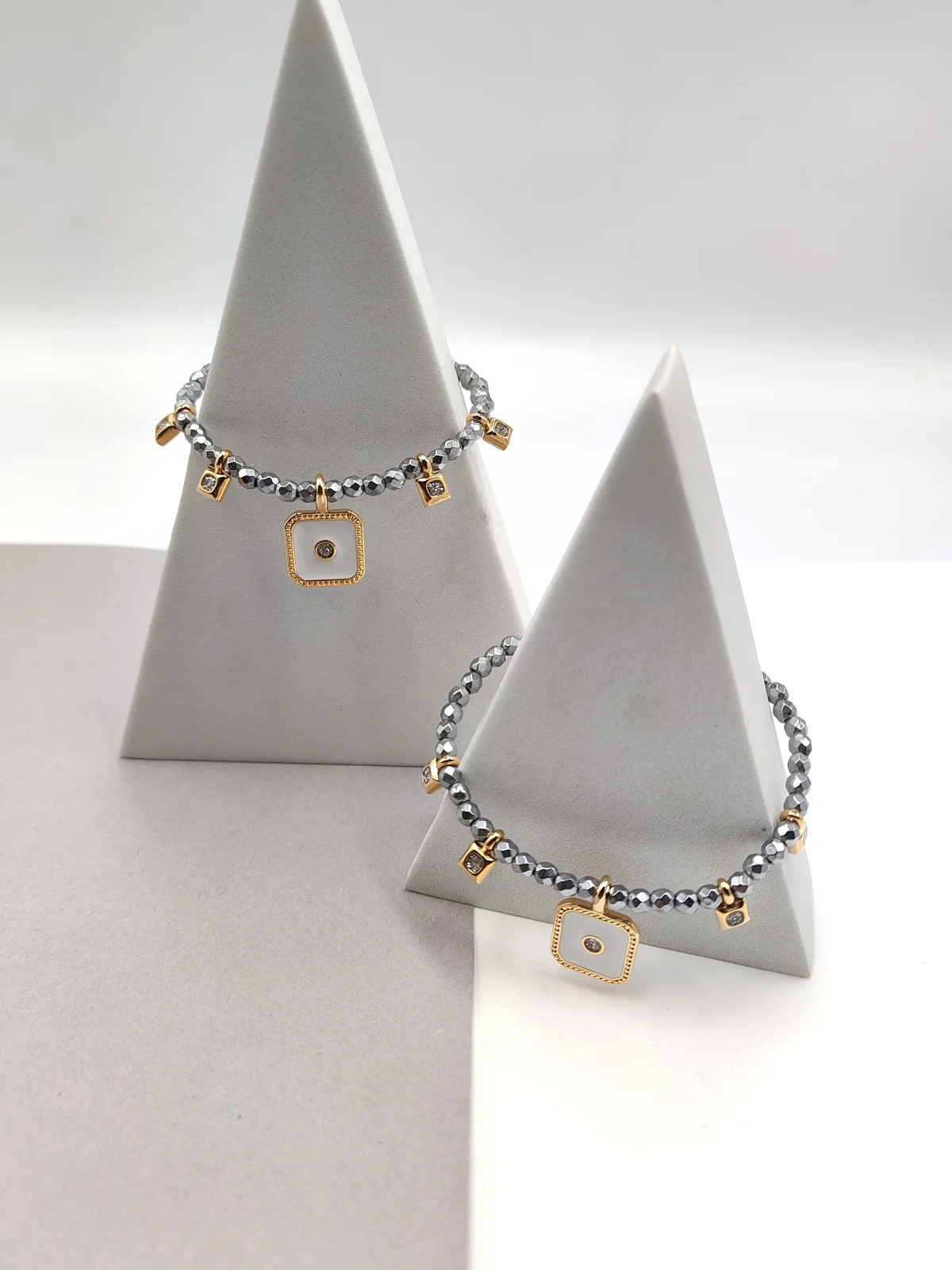 Bracelet with Hematite Beads and Gold-Plated Enamel Details by Magis Handmade Jewels – view 2