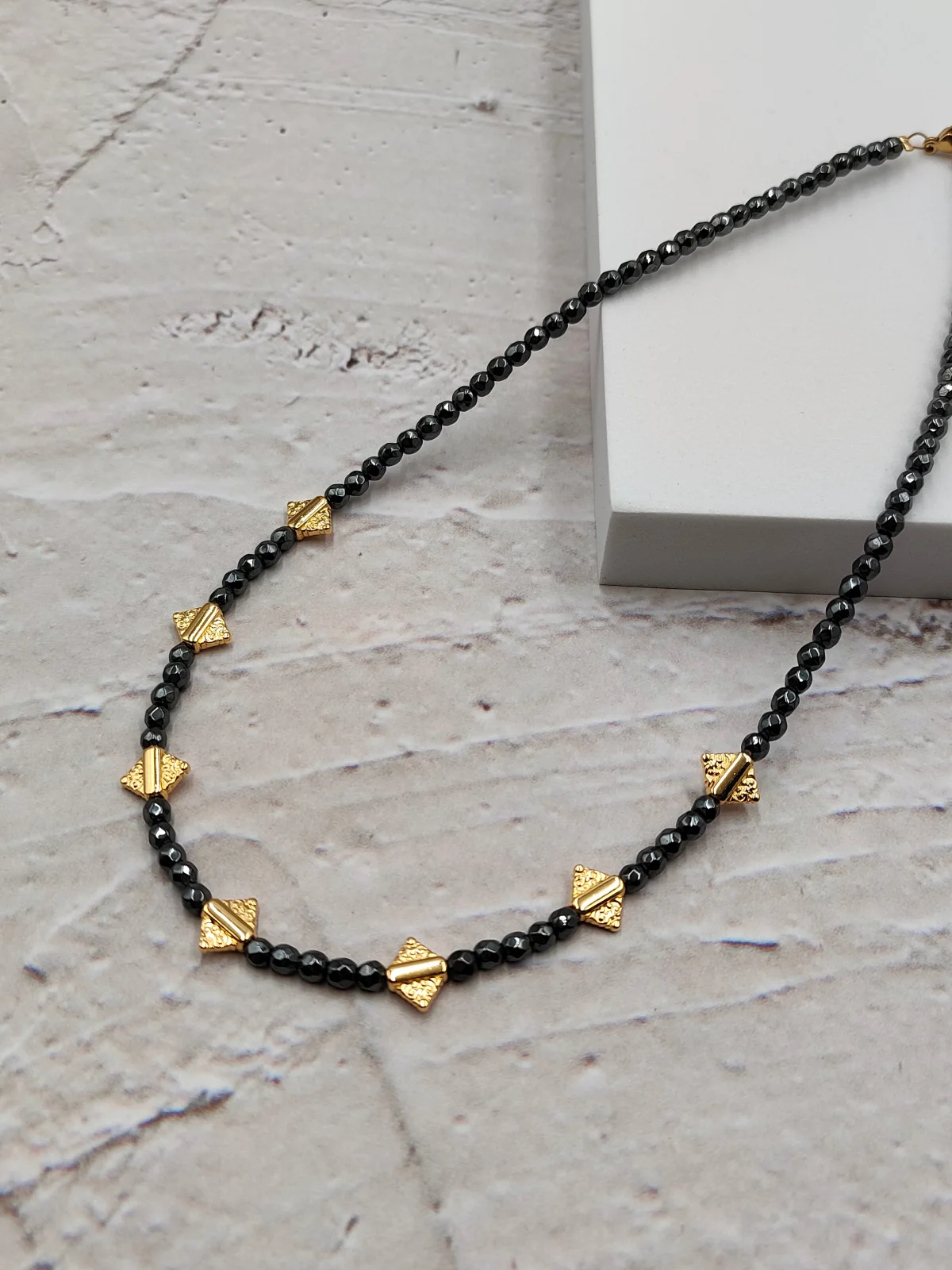 Necklace with Hematite Beads and Gold-Plated Details by Magis Handmade Jewels – view 2