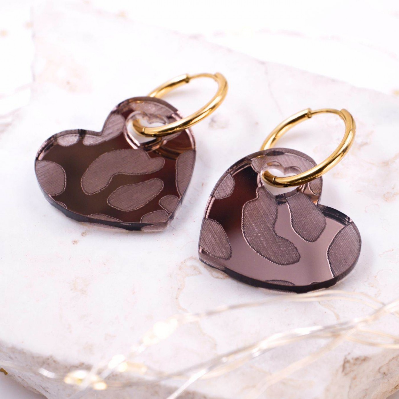 Steel Hoop Earrings - Animal Print Hearts — Earrings from Toolittle — additional view 2