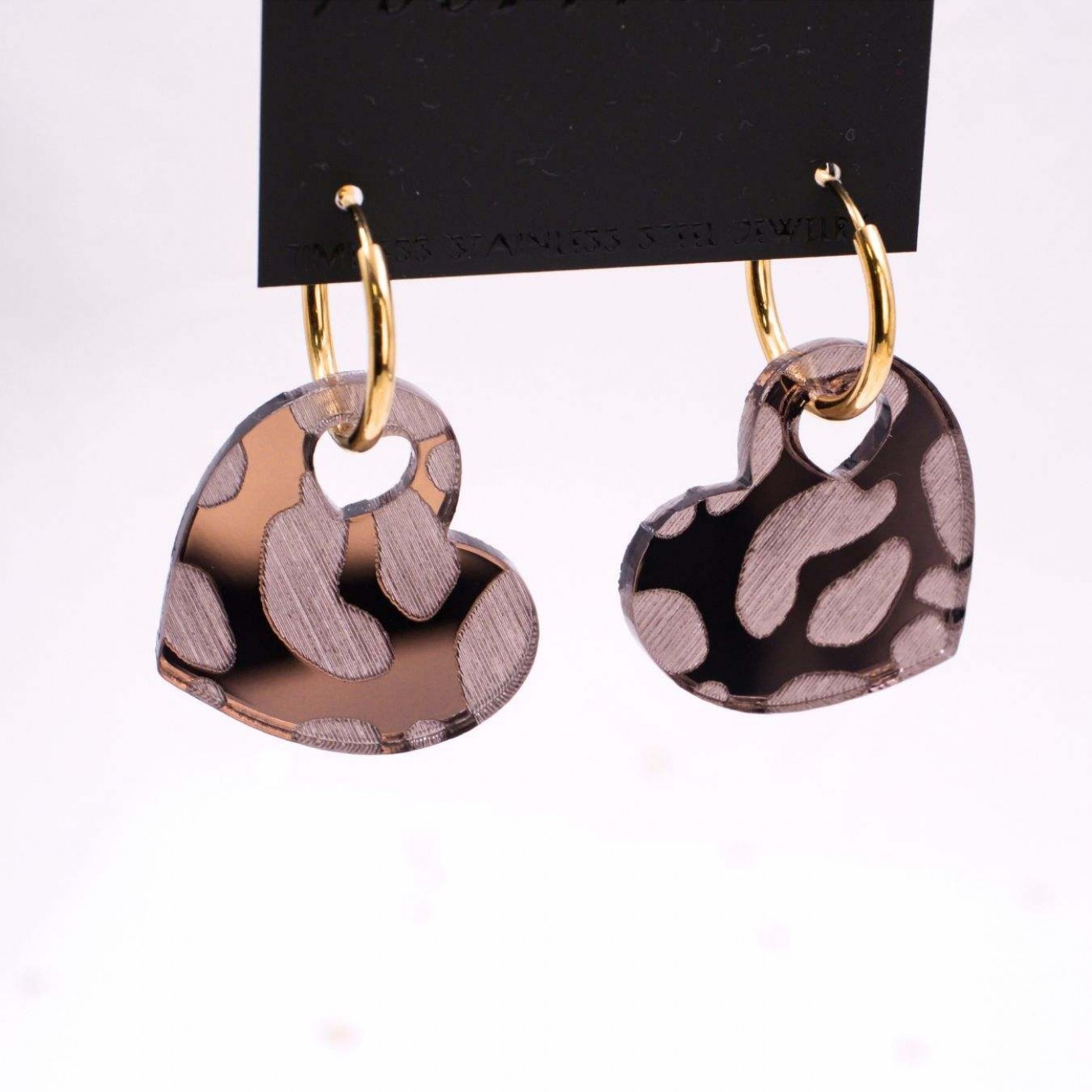 Steel Hoop Earrings - Animal Print Hearts — Earrings from Toolittle — additional view 3