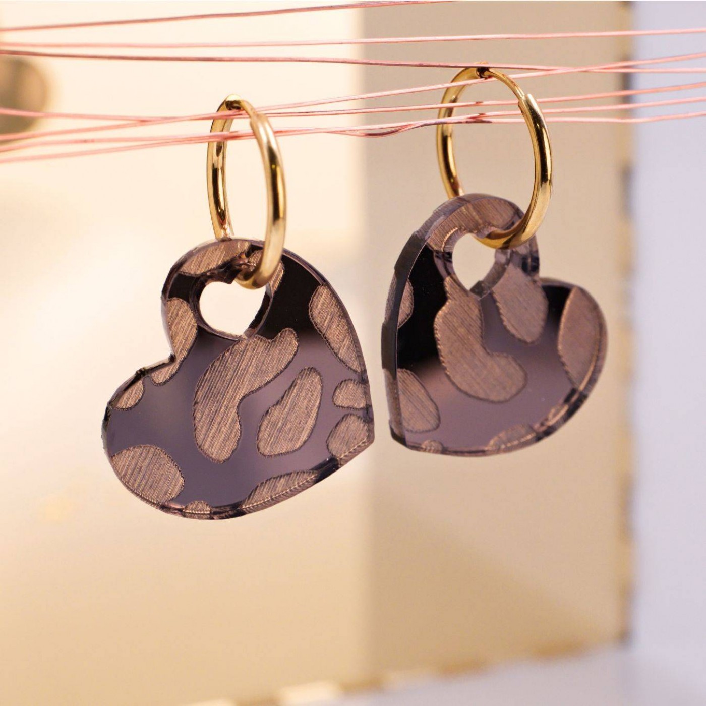 Steel Hoop Earrings - Animal Print Hearts — Earrings from Toolittle — additional view 4